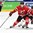 HELSINKI, FINLAND - DECEMBER 29: Canada's Joe Hicketts #2 pulls the puck away from Switzerland's Denis Malgin #13 during preliminary round action at the 2016 IIHF World Junior Championship. (Photo by Matt Zambonin/HHOF-IIHF Images)

